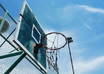 basketball-court-under-blue-sky
