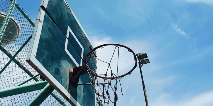 basketball-court-under-blue-sky