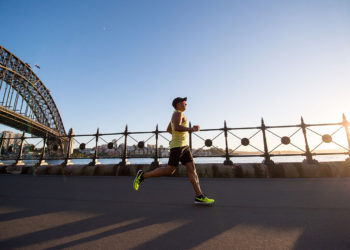 man-running-beside-the-river