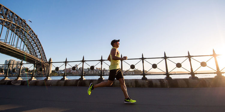man-running-beside-the-river