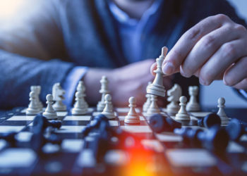 a-man-play-chess