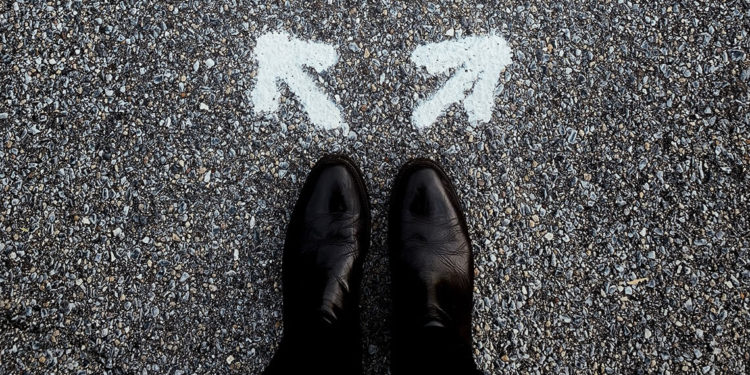leather-shoes-on-asphalt-road