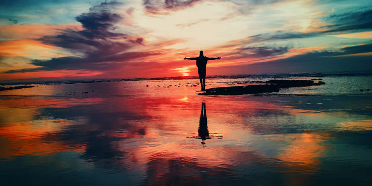 a-man-standing-in-the-sunset-lianchiyu-blog-the-top-of-your-profession
